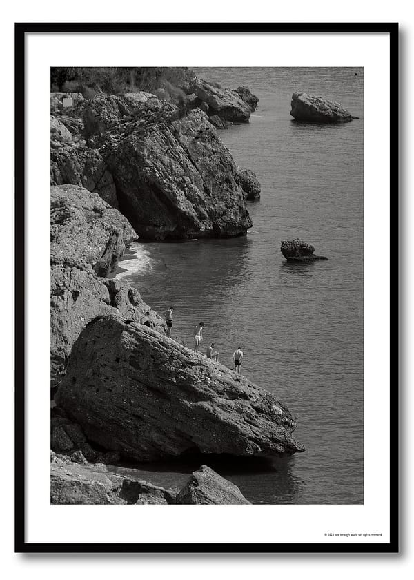 Mediterranean coast photography print showing four figures on limestone rocks above a calm sea, monochrome coastal observation