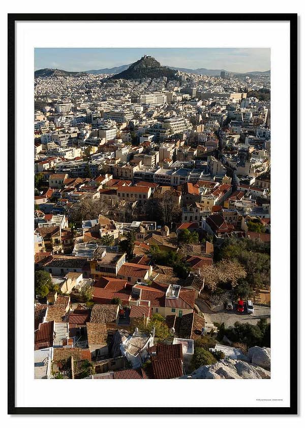 Artist-led photography framed print of Athens urban architecture in soft January morning light, featuring a cacophony of traditional pantile roofs and concrete structures on 250gsm heavyweight silken-touch media.